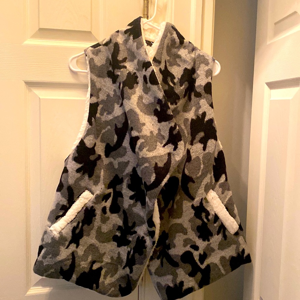 Fleece camouflage jacket, New w/ tags.Smoke free environment and no pets.